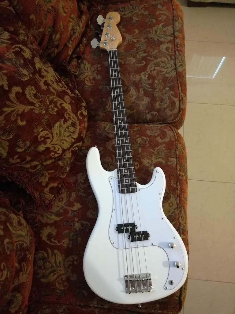 Glarry Electric Bass Guitar Full Size 4 String Rosewood Basswood Fire Style Exquisite Burning Bass (Red) customer photo 1