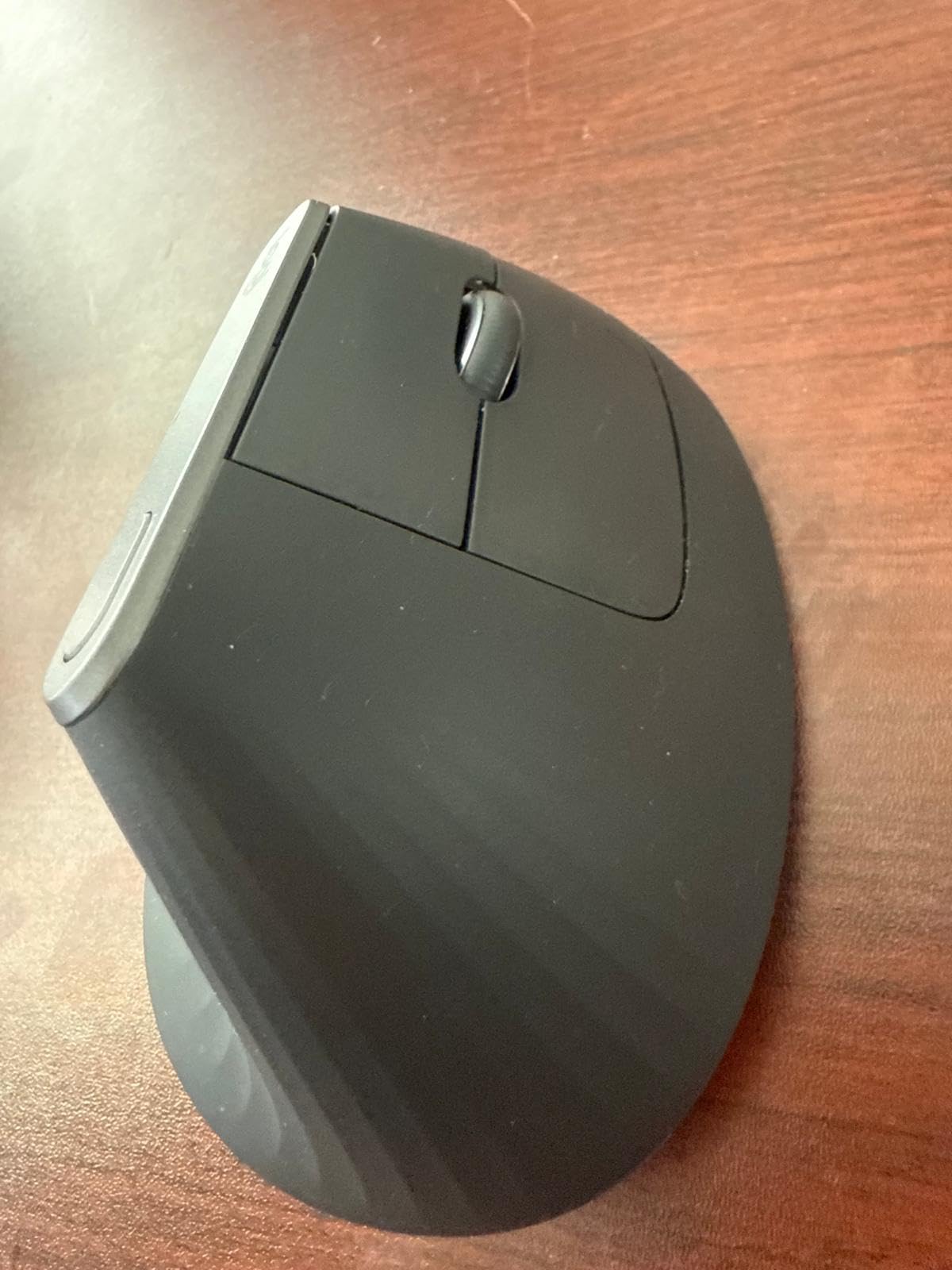 Logitech MX Vertical Wireless Mouse Ergonomic Design - Graphite | Reduces muscle strain, move content between 3 Windows and Apple computers, rechargeable customer photo 1