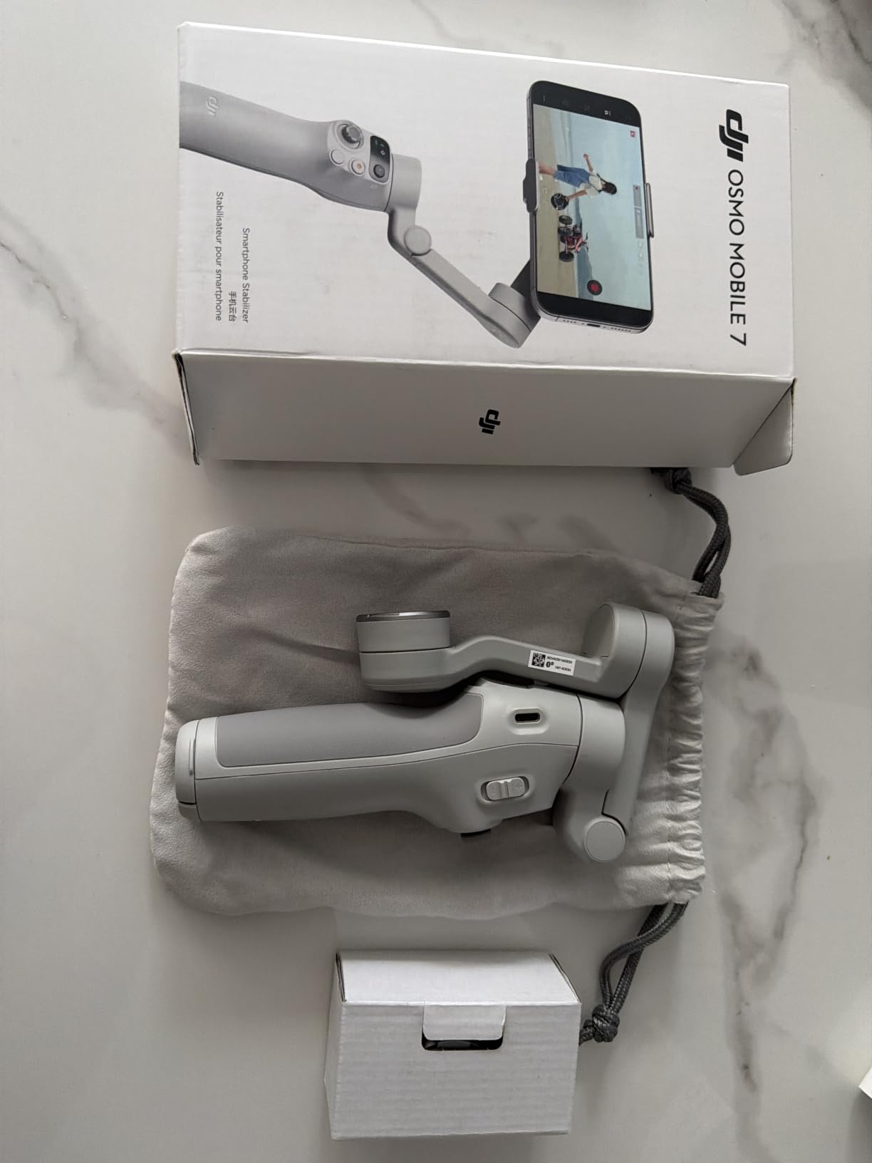 DJI Osmo Mobile 7 Gimbal Stabilizer for iPhone & Android, 3-Axis Gimbal | Built-in Tripod, Ultra-Light, Comfortable Grip, ActiveTrack, ShotGuides, One-Tap Edit, 10hrs Use, Phone Charging customer photo 1