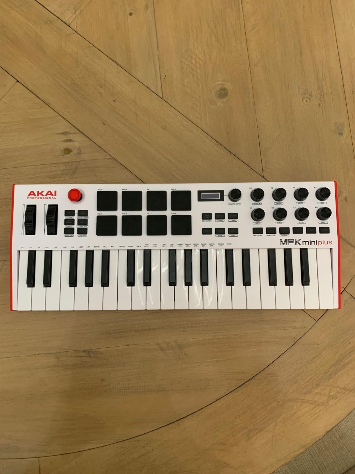 Akai Professional MPK Mini Plus 37-Key USB MIDI Keyboard Controller, White | Velocity-Sensitive Mini Keys, 8 MPC Pads, 64 Step Sequencer, MIDI/CV/Gate I/O, Software Suite Included, for Beat Makers customer photo 1