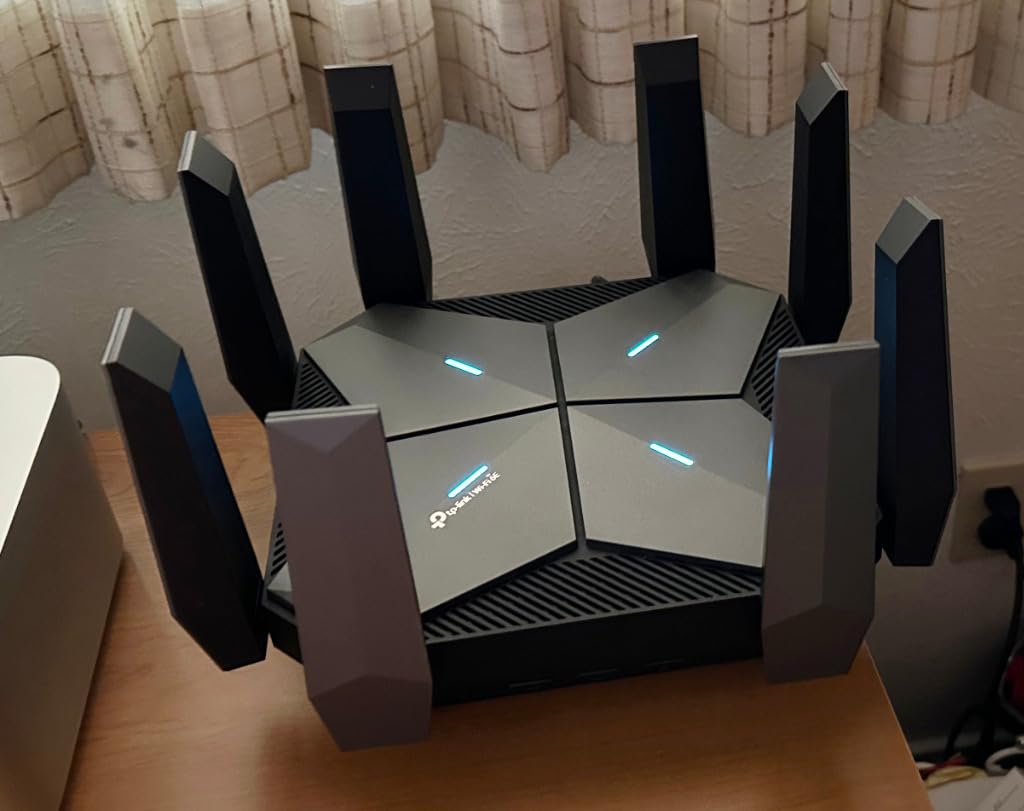 TP-Link Tri-Band AXE5400 Wi-Fi 6E Gaming Router (Archer GXE75) - 5.4 Gbps, 1x2.5G + 4x1G Ports, RGB Lighting customer photo 2