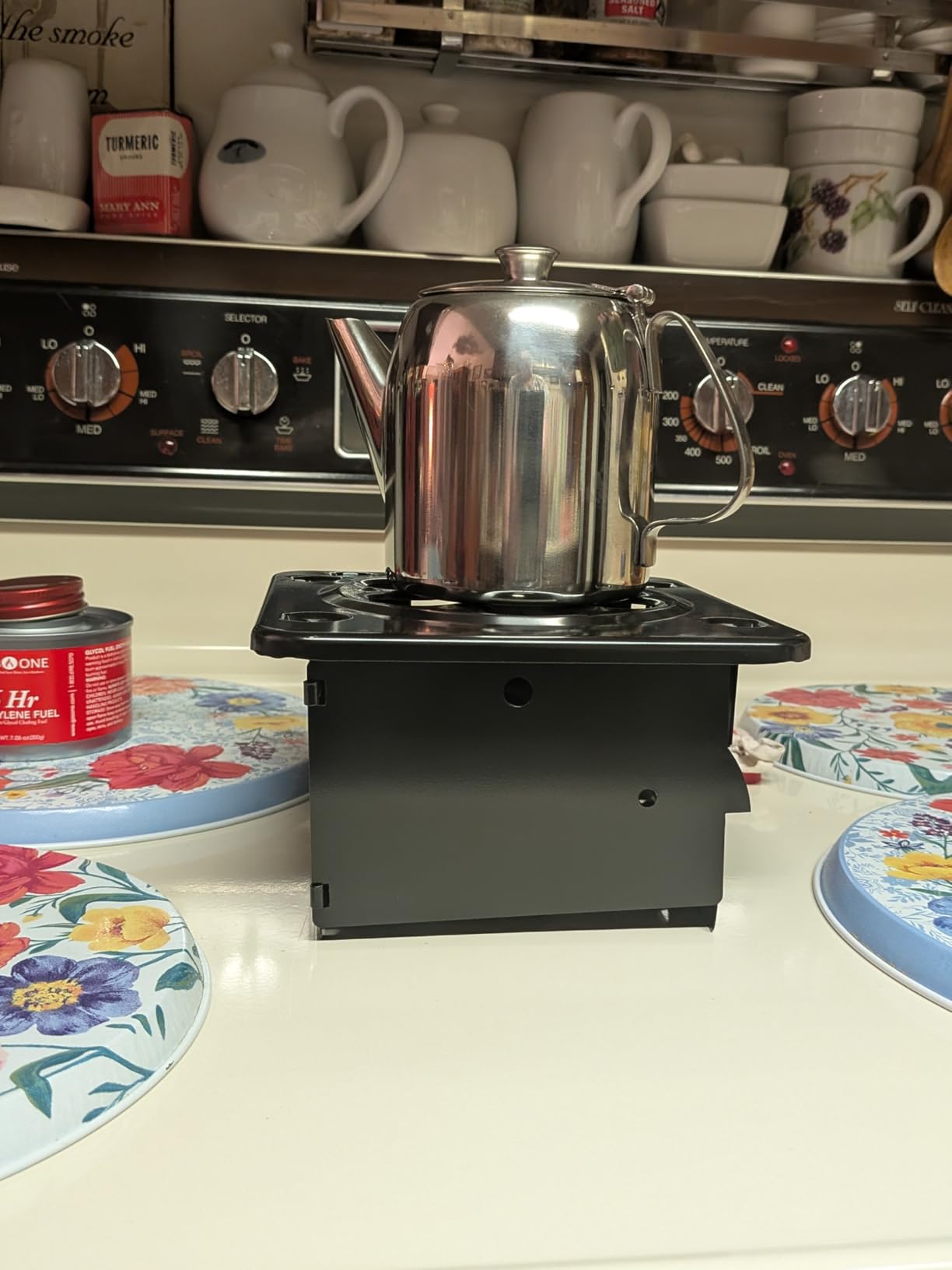 Coghlan's Portable Folding Camp Stove – Compact, Lightweight Steel Cooking Stove for Camping, Backpacking, Hiking, or Emergency Use – Uses Canned Heat or Fuel Tablets, Black customer photo 1